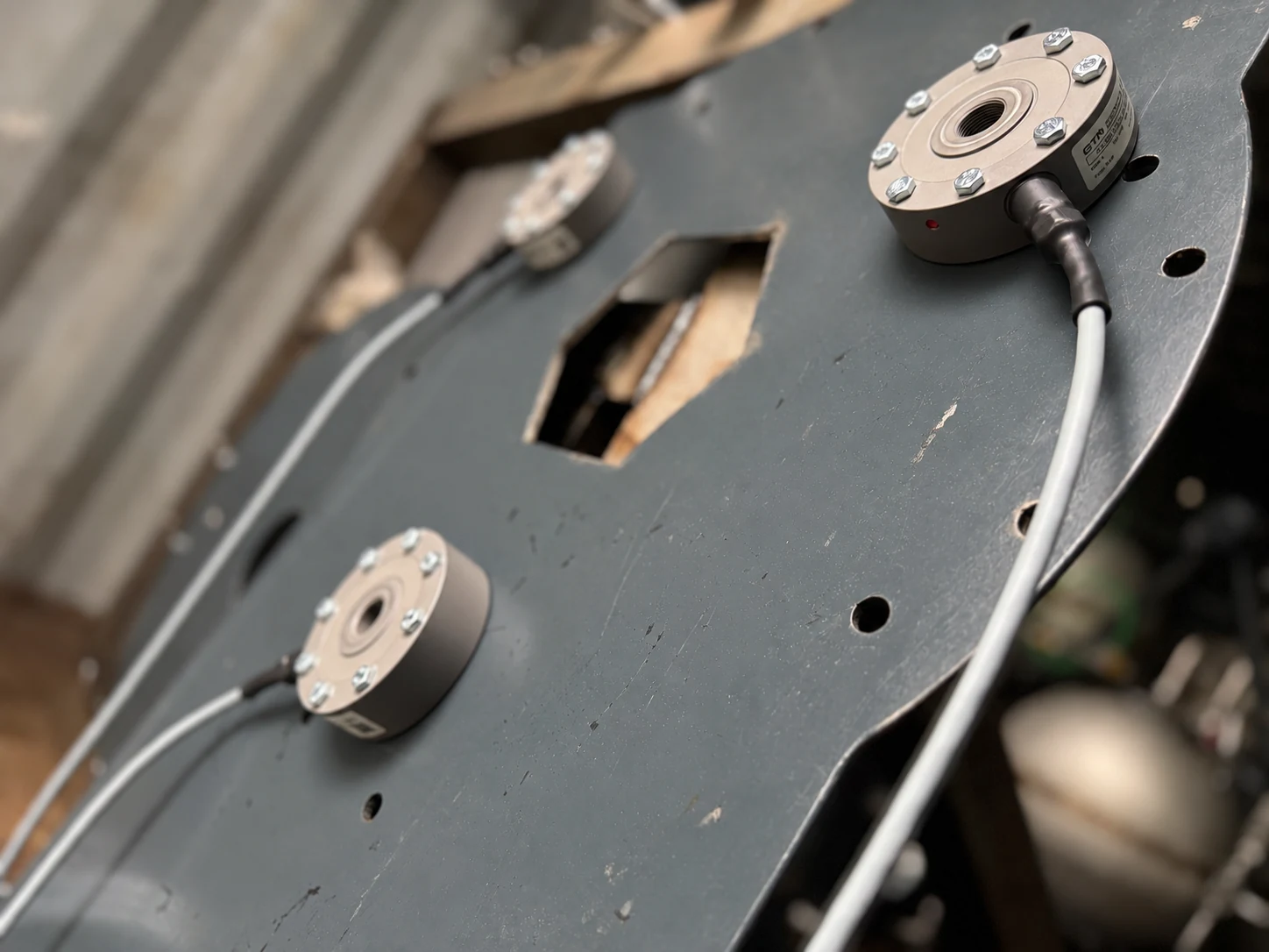 GTM force sensors mounted on an Elara rocket test stand plate